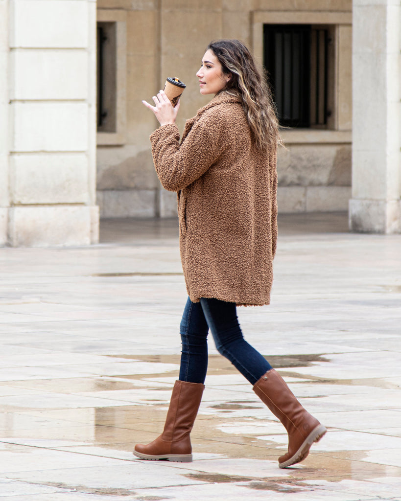Bambina botas de piel con forro interior de pelo. cuero