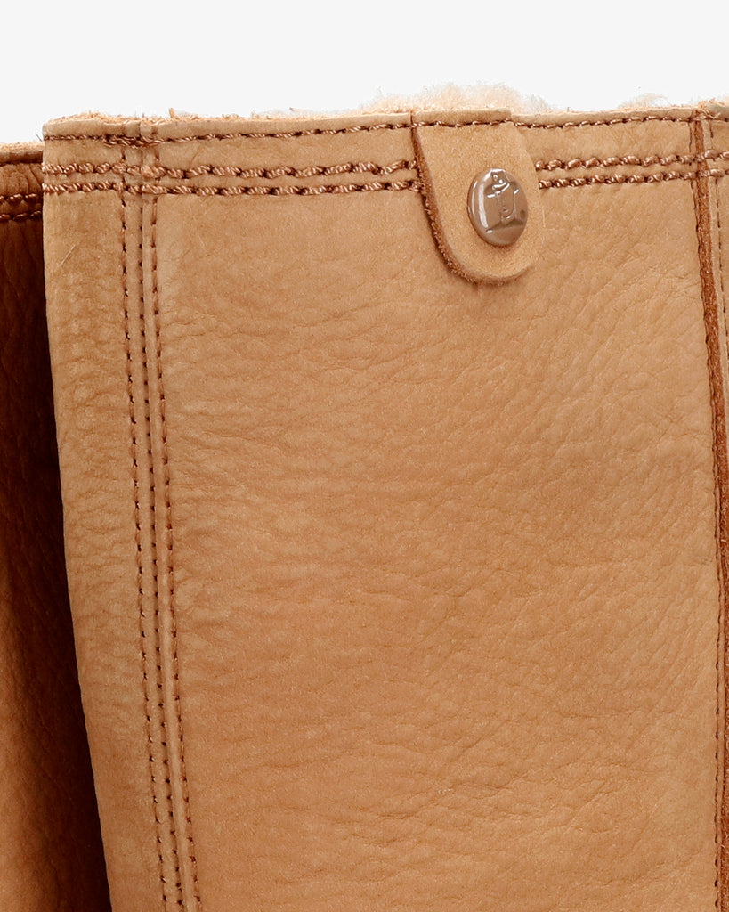 Bambina botas de piel con forro interior de pelo. camel