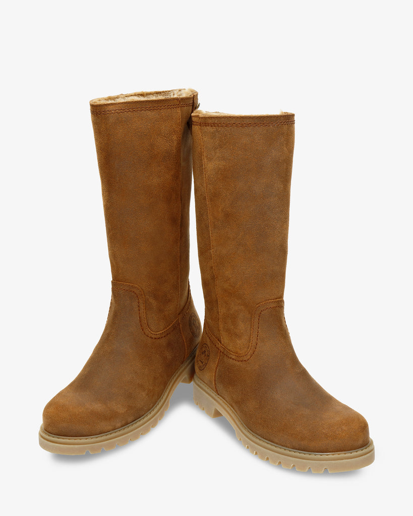 Bambina botas de piel con forro interior de pelo. cuero