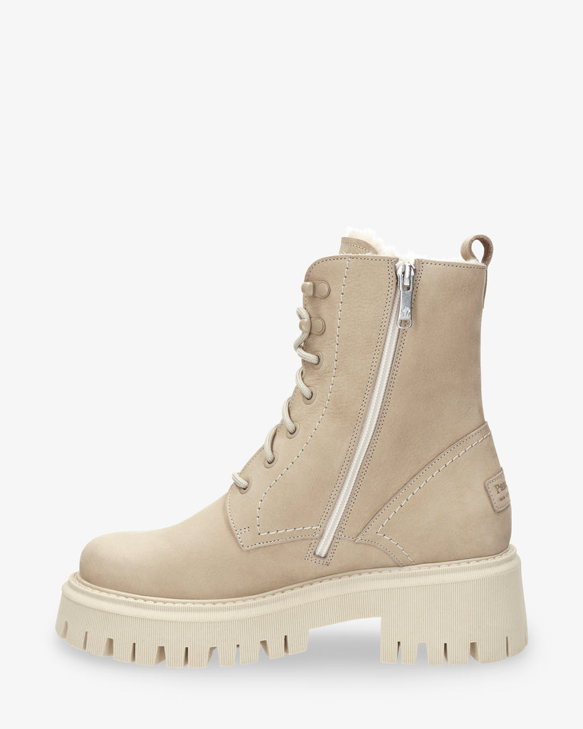 Farai botas de piel con forro interior de pelo. crudo