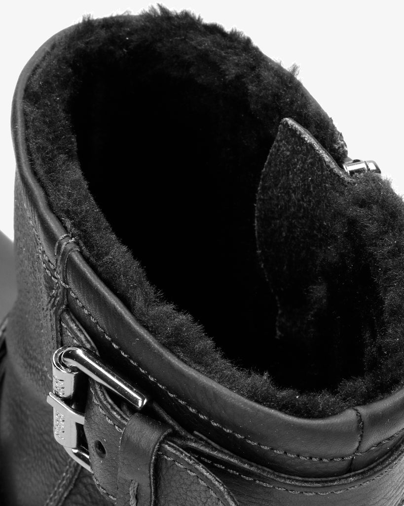 Faust botas de piel con forro interior de pelo. negro
