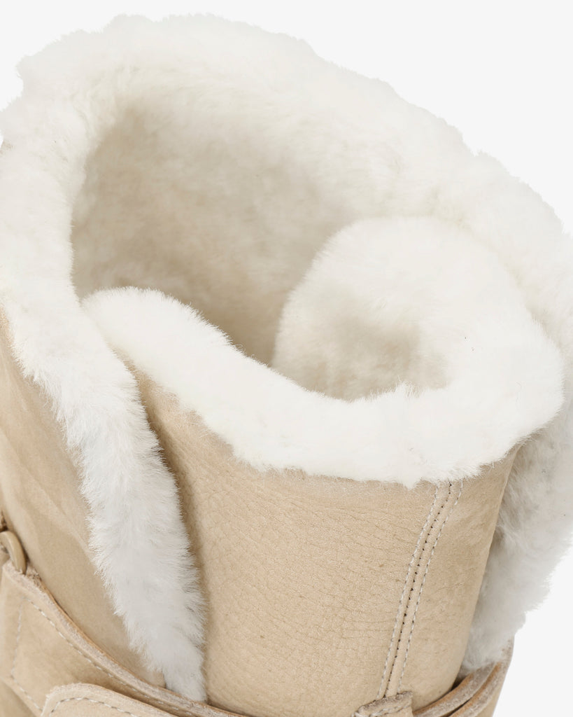 Felia Igloo Trav botas de piel con forro interior de pelo natural. crudo