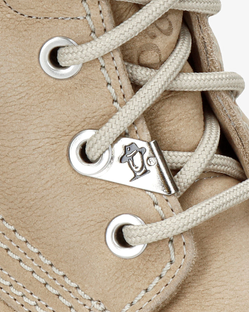 Felicia botas de piel con forro interior de pelo. crudo