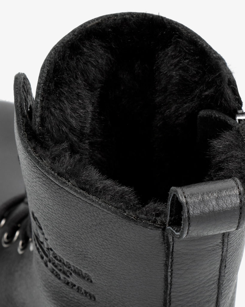 Frisia botas de piel con forro interior de pelo. negro